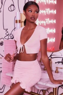 Ruched Bodycon Mini Skirt In Blush 12 Ruched Bodycon Mini Skirt In Blush -Glam Dress Store 3400 no ties 3409 here for the frill 3 blush front tie plunge crop top capped sleeve high waisted ruched frill skirt 3 93dff8e3 c97b 4c71 a739 6ef2de7fb472