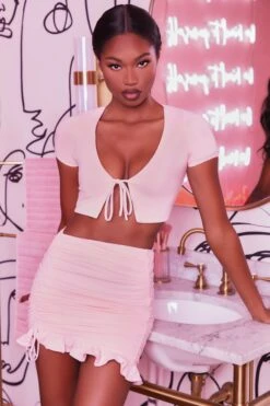 Ruched Bodycon Mini Skirt In Blush 14 Ruched Bodycon Mini Skirt In Blush -Glam Dress Store 3400 no ties 3409 here for the frill 6 blush front tie plunge crop top capped sleeve high waisted ruched frill skirt 3 db43c540 4739 450e 8091 c80b757b15f1