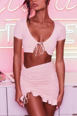 Ruched Bodycon Mini Skirt In Blush 17 Ruched Bodycon Mini Skirt In Blush -Glam Dress Store 3400 no ties 3409 here for the frill 8 blush front tie plunge crop top capped sleeve high waisted ruched frill skirt 8 skirt only 1