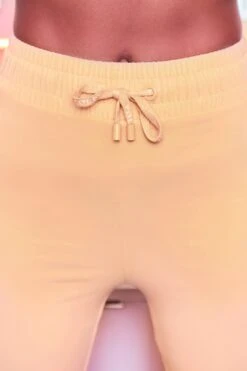 Laid Back Wide Leg Trousers In Peach -Glam Dress Store 3401 take the plunge 3097 laid back 11 peach high waisted flare trousers plunge front tie capped sleeve crop top 1 3