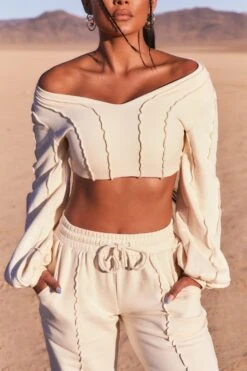 Uncovered Exposed Seam Bardot Crop Top In Ivory -Glam Dress Store 3740 1 uncovered ivory exposed seam v neck balloon sleeve crop top