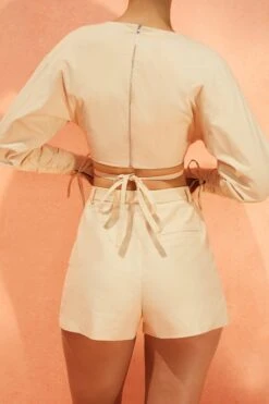 Pleated Shorts In Sand -Glam Dress Store 4160 4185 10 suite life buena vista sand balloon sleeve low neck crop top high waisted shorts 1