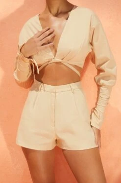 Pleated Shorts In Sand -Glam Dress Store 4160 4185 6 suite life buena vista sand balloon sleeve low neck crop top high waisted shorts 1