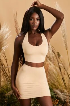 Bodycon Mini Skirt In Beige -Glam Dress Store 4239 4236 2 on the down low beige halter neck top bodycon mini skirt