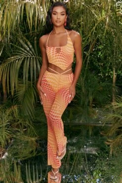 Tall Printed Mesh Flared Trousers In Orange -Glam Dress Store 4310 1 match it up orange abstract print halter neck crop top cut out sheer flares 3