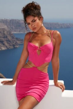 Waist Chain Mini Skirt In Pink -Glam Dress Store 4341 4351 6 tan lines meet again pink chain detailing bralette mini skirt co ord