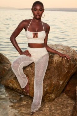 Tall Beaded Flare Trousers In Ivory 18 Tall Beaded Flare Trousers In Ivory -Glam Dress Store 4370 11 sheer for you ivory pearl embelllished cut out crop top sheer beach trousers 1 3