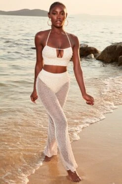 Beaded Crochet Crop Top In Ivory -Glam Dress Store 4370 4 sheer for you ivory pearl embelllished cut out crop top sheer beach trousers 1