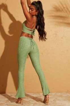 Double Layered Cut Out Crop Top In Green 31 Double Layered Cut Out Crop Top In Green -Glam Dress Store 5113 5095 1 Cream Double Layered Crop Top Lace Up Back Trousers 1c74bce4 10b2 44a2 a76f a26b74d3f437