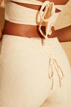 Double Layered Cut Out Crop Top In Cream 27 Double Layered Cut Out Crop Top In Cream -Glam Dress Store 5113 5095 20 Cream Double Layered Crop Top Lace Up Back Trousers