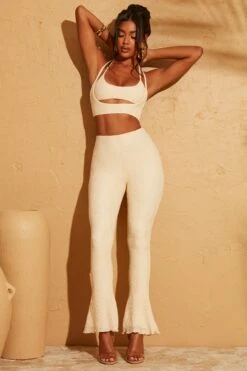 Double Layered Cut Out Crop Top In Cream 34 Double Layered Cut Out Crop Top In Cream -Glam Dress Store 5113 5095 3 Cream Double Layered Crop Top Lace Up Back Trousers 5fabdd3f 379f 44c0 8eac 73707a3499a4