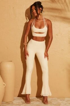 Double Layered Cut Out Crop Top In Cream 38 Double Layered Cut Out Crop Top In Cream -Glam Dress Store 5113 5095 7 Cream Double Layered Crop Top Lace Up Back Trousers 610a4b77 4627 4fd6 9aa1 aa9908f79a92