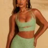 Double Layered Cut Out Crop Top In Green 2 Double Layered Cut Out Crop Top In Green -Glam Dress Store 5113 5095 8 Cream Double Layered Crop Top Lace Up Back Trousers 4463517c 8bd0 4bd9 a00d cc566a4276d5