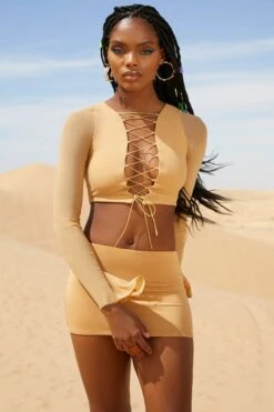 Low Rise Micro Mini Skirt In Beige -Glam Dress Store 5126 5320 2 Riverside Beige Lace Up Long Sleeve Crop Top Low Rise Mini Skirt 09076e12 6a90 493b bf91 50ee10b55237