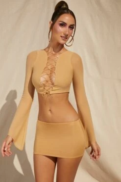 Lace Up Long Sleeve Crop Top In Beige -Glam Dress Store 5126 5320 6 Riverside Beige Lace Up Long Sleeve Crop Top Low Rise Mini Skirt 7bacc61a 5696 454e aba0 ede59165084e