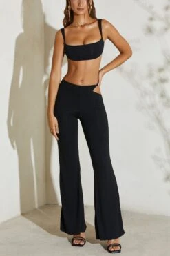 Twist Strap Cut Out Flare Trousers In Black -Glam Dress Store 5148 3 Callie Black Twost Cut Out Flare Trousers 96b3ee33 6b8a 48d7 9d25 f264a20a0e26