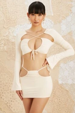 Side Tie Mini Skirt In Ivory 14 Side Tie Mini Skirt In Ivory -Glam Dress Store 5209 5152 1 Flora Jardin Ivory Drawstring Bust Ruched Crop Top Side Tie Mini Skirt