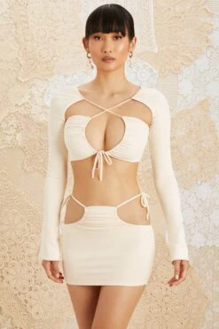 Side Tie Mini Skirt In Ivory 15 Side Tie Mini Skirt In Ivory -Glam Dress Store 5209 5152 2 Flora Jardin Ivory Drawstring Bust Ruched Crop Top Side Tie Mini Skirt