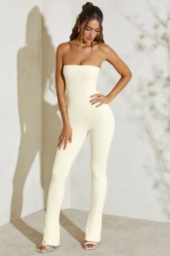 Strapless Flared Hem Jumpsuit In Ivory -Glam Dress Store 5247 1 Jamila Ivory Strapless Cut Out Flare Jumpsuit