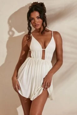 Ruched Skater Skirt Mini Dress In Ivory -Glam Dress Store 5411 3 Carmen Ivory Strappy Pointed Hem Mini Dress