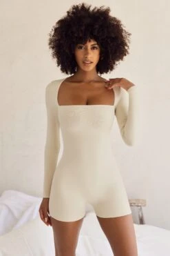 Long Sleeve Square Neck Unitard In Ivory 13 Long Sleeve Square Neck Unitard In Ivory -Glam Dress Store 5415 1 Ivory Rue Long Sleeve Square Neck Playsuit
