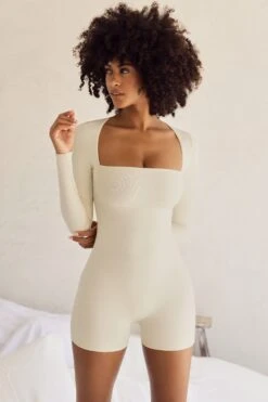 Long Sleeve Square Neck Unitard In Ivory 15 Long Sleeve Square Neck Unitard In Ivory -Glam Dress Store 5415 3 vory Rue Long Sleeve Square Neck Playsuit