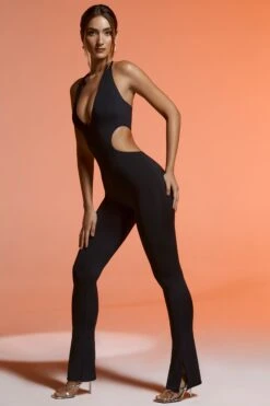 Plunge Neck Cut Out Jumpsuit In Black -Glam Dress Store 5444 3 Black Cut Out Plunge Jumpsuit 1 7cc92683 5fc9 4826 a3b2 a639c9b5d815