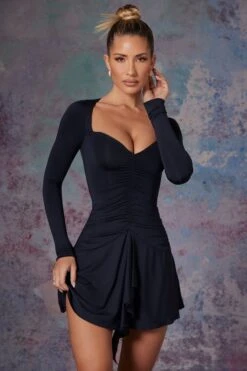 Long Sleeve Waterfall Skirt Mini Dress In Midnight Black