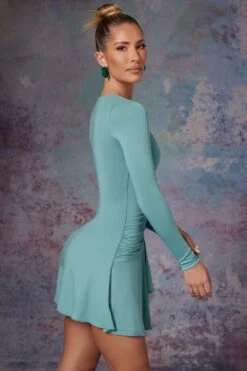 Long Sleeve Waterfall Skirt Mini Dress In Light Teal 11 Long Sleeve Waterfall Skirt Mini Dress In Light Teal -Glam Dress Store 5473 5 Lili Blue Long Sleeve Halter Neck Mini Dress With Waterfall Skirtcopy