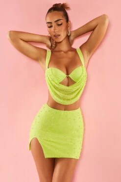 Low Plunge Neck Crop Top In Lime 14 Low Plunge Neck Crop Top In Lime -Glam Dress Store 5595 5591 6 Larvotto Bellelle Lime Low Plunge Crop Top Split High Waisted Ultra Mini Skirt 847845c9 496e 4a9e a29c 28d3172fe0a9