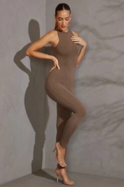 Racer Neck Jumpsuit In Taupe -Glam Dress Store 5610 7 Vida Charcoal Racer Neck Romper f456c1d9 7046 4465 9512 617ea8a690bc
