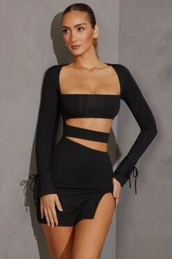 Long Sleeve Cut Out Mini Dress In Black 13 Long Sleeve Cut Out Mini Dress In Black -Glam Dress Store 5615 1 Black Bandeau Cut Out Mini Dress