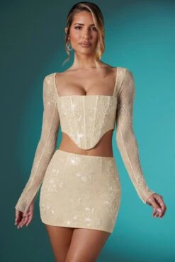 Long Sleeve Embellished Lace Corset Crop Top In Ivory 22 Long Sleeve Embellished Lace Corset Crop Top In Ivory -Glam Dress Store 5958 5960 3 Ivory Embellished Lace Corset Top Mini Skirt 031c6bd1 ae8e 4f86 8d22 4f857adc5360