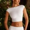 Cap Sleeve Open Back Crop Top In White -Glam Dress Store 6063 6205 13 Juno Hollis White Crop Top Ruched Trousers 2224afa8 9a77 4a16 9f80 8da43c2475ae