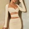 Long Sleeve Cut Out Mini Dress In Stone 2 Long Sleeve Cut Out Mini Dress In Stone -Glam Dress Store 6163 4 Stone Drape Cut Out Long Sleeve Mini Dress 245cb2de 95e5 48da 8e04 17269985c8dc