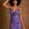 Plunge Neck Mini Dress With Flower Detail In Periwinkle Print -Glam Dress Store 6379 2 Nermin Periwinkle Print Low Plunge Ruched Flower Detail Micro Mini Dress