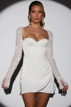 Long Sleeve Embellished A-line Mini Dress In White 13 Long Sleeve Embellished A-line Mini Dress In White -Glam Dress Store 6717 2 Geneva White Wrap Over Skirt with Split