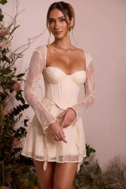 Long Sleeve Lace Corset Mini Dress In Ivory 18 Long Sleeve Lace Corset Mini Dress In Ivory -Glam Dress Store 6729 2 Ninette Ivory Lace Long Sleeve Mini Dress