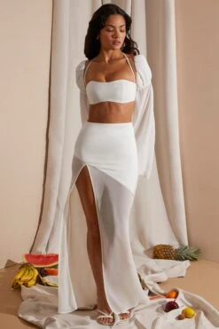 Mid Rise High Slit Maxi Skirt In White 15 Mid Rise High Slit Maxi Skirt In White -Glam Dress Store 6739 3 Eden White Split Gown Skirt