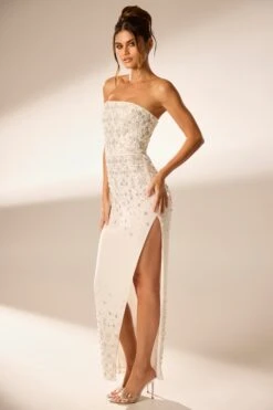 Hand Embellished Bandeau Maxi Dress In Ivory 19 Hand Embellished Bandeau Maxi Dress In Ivory -Glam Dress Store 6900 7 Alcyone Ivory Corsetted Maxi With Split Scayyered Embelishement