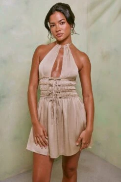 Halter Neck Cut Out Shirred Mini Dress In Sand -Glam Dress Store 7191 1 Tulia Sand Crinkle Tie Up Halterneck Shirring Mini Dress