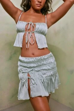 Shirred Tie Up Front Crop Top In Pastel Green 18 Shirred Tie Up Front Crop Top In Pastel Green -Glam Dress Store 7195 7206 8 Pastel Green Tie Up Front Crop Top Crinkle Tie Up Asymmetrical Shirring Mini Skirt