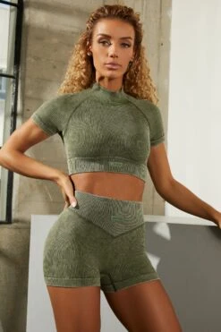 Seamless High Neck Cap Sleeve Crop Top In Dark Khaki 11 Seamless High Neck Cap Sleeve Crop Top In Dark Khaki -Glam Dress Store bt0329 bt0336 3 dark khaki acid wash ribbed high neck crop top shorts set