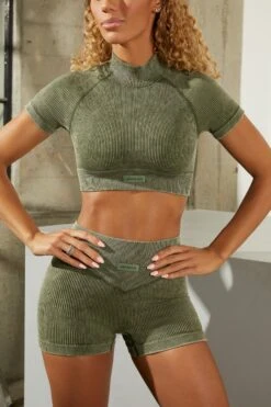 Seamless High Neck Cap Sleeve Crop Top In Dark Khaki 12 Seamless High Neck Cap Sleeve Crop Top In Dark Khaki -Glam Dress Store bt0329 bt0336 5 dark khaki acid wash ribbed high neck crop top shorts set