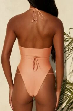 Secret Getaway Halter Neck Cut Out Swimsuit In Light Orange 22 Secret Getaway Halter Neck Cut Out Swimsuit In Light Orange -Glam Dress Store gg0004 tan